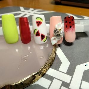 Custom press on nails and application kit included with instructions.